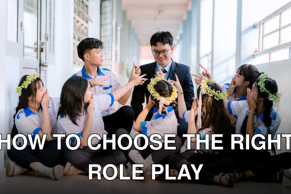 Group of happy students in uniform celebrating with their teacher in a hallway.