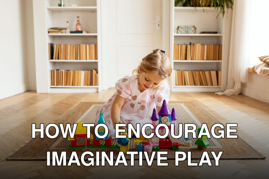 A young girl in a pink dress playing with colorful building blocks on a carpeted floor in a cozy room.