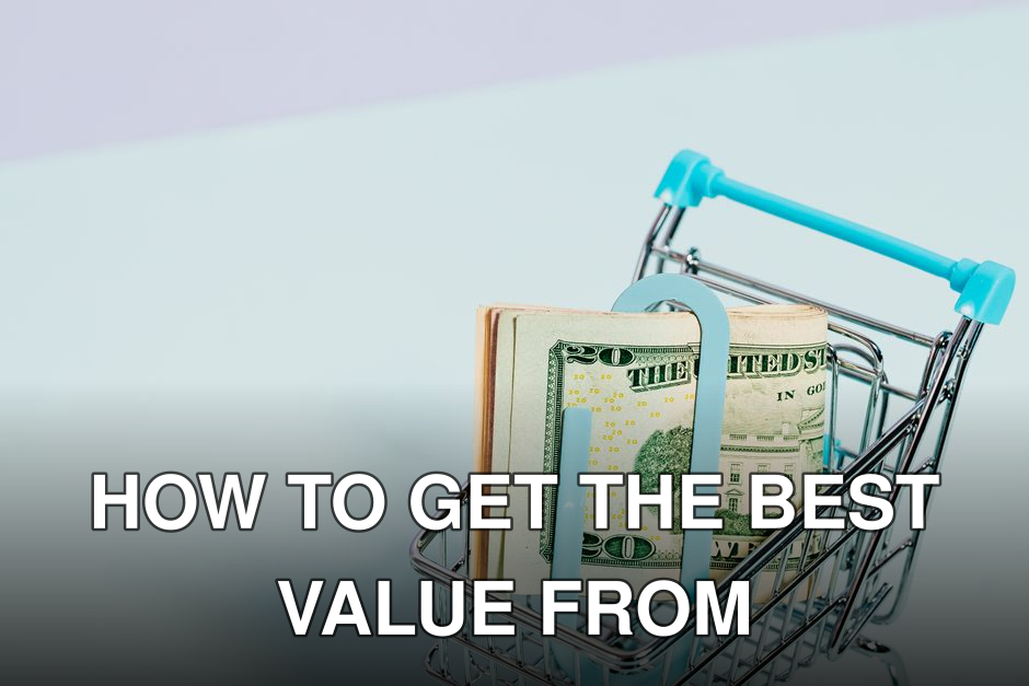 A shopping cart holding a stack of US dollar bills symbolizes financial savings and consumer spending.