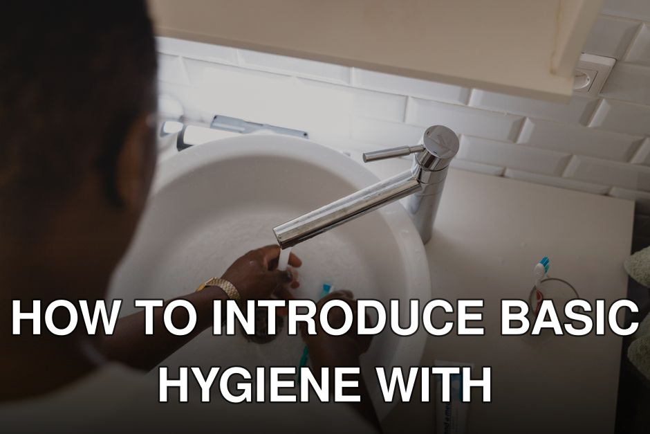 A person washing hands in a bathroom sink with a faucet and toothbrush visible, promoting hygiene.