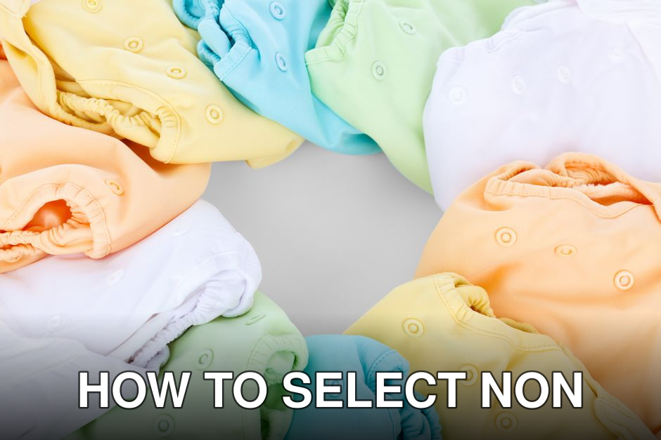 A top-view of colorful cloth diapers arranged in a circular pattern showcasing vivid hues and comfort.