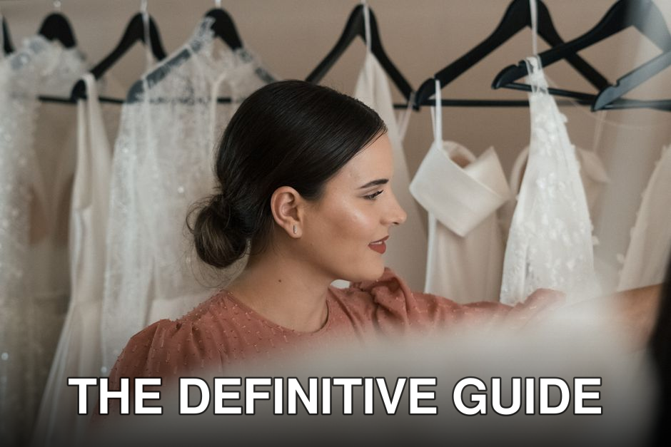 Bride-to-be selecting a wedding dress in a chic bridal boutique.