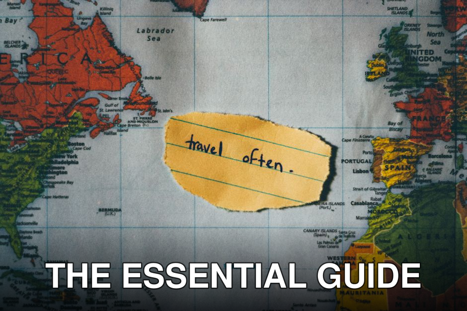 A motivating note 'travel often' placed over a colorful world map, inspiring exploration.