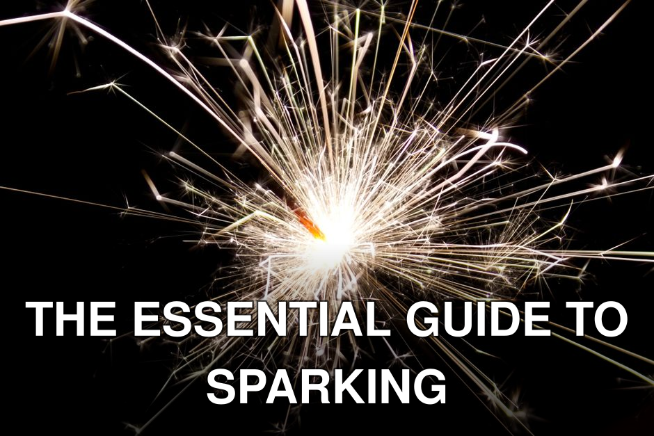 Vivid sparkler explosion captured with precise detail on a dark backdrop, showcasing vibrant light trails.