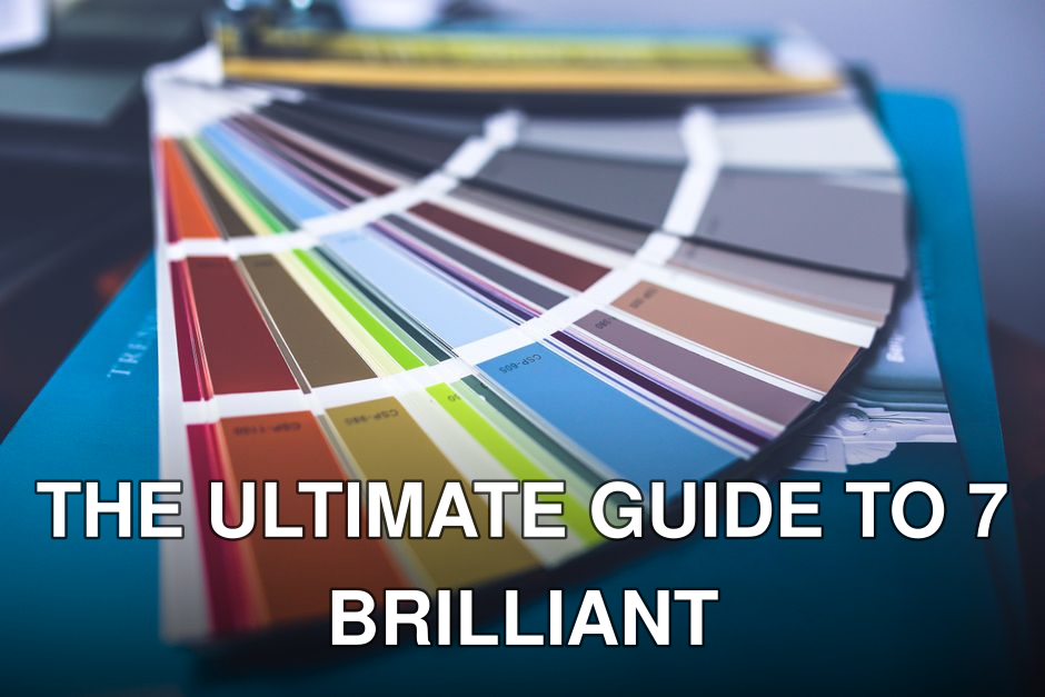 A collection of colorful paint swatches spread out showcasing a variety of hues.
