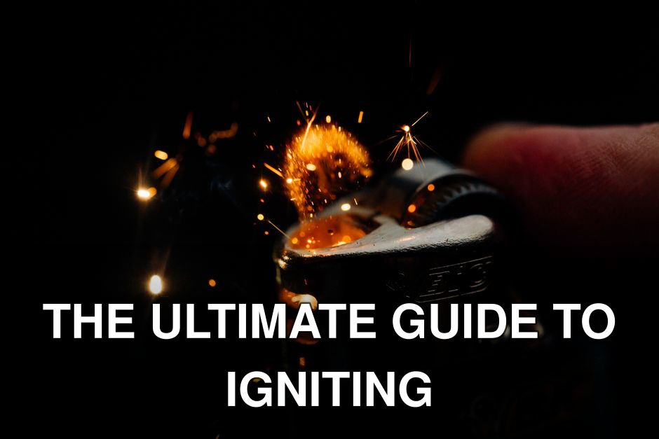 Close-up image of a lighter igniting with visible sparks and flame in a dark setting.