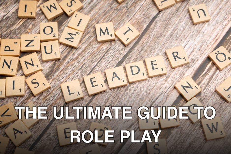 Wooden Scrabble tiles on a table spelling 'Leader' symbolize leadership and strategy.