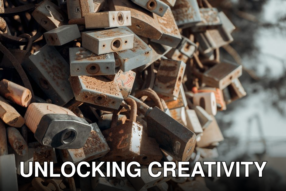 A close-up of numerous rusty padlocks clustered together outdoors, symbolizing security and abandonment.