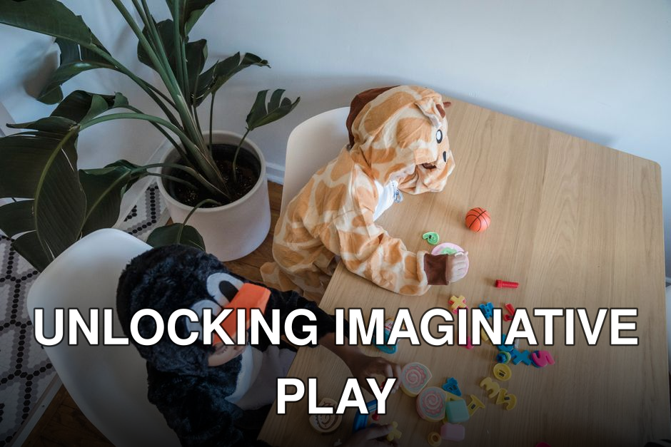 Two children in animal costumes playing with toys at a table indoors.