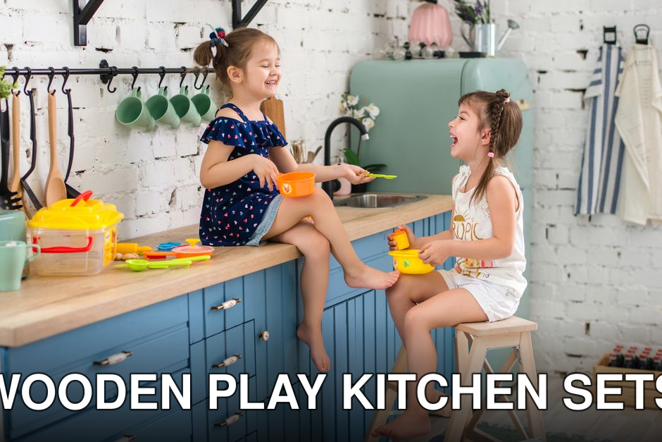 Two young girls enjoying imaginative play with plastic toys in a cozy kitchen.
