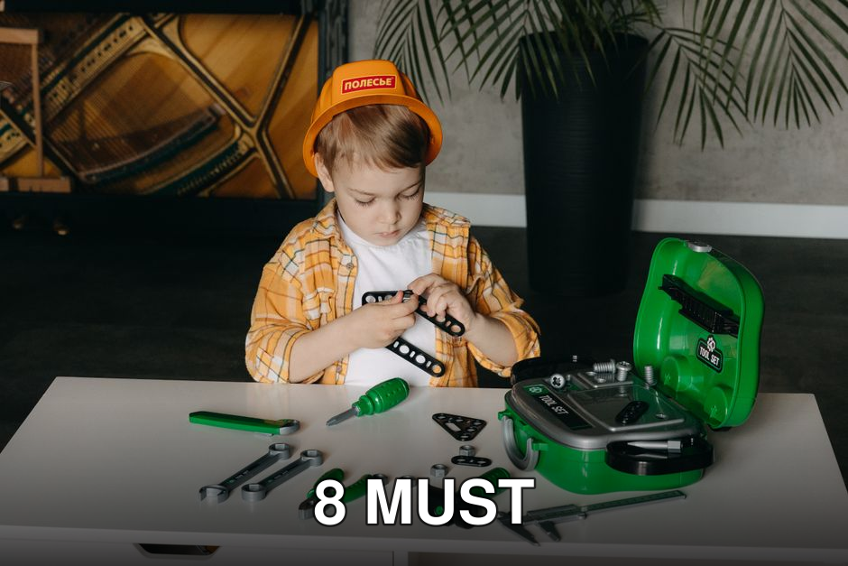 A child playing with a tool set indoors, enhancing creativity and learning.