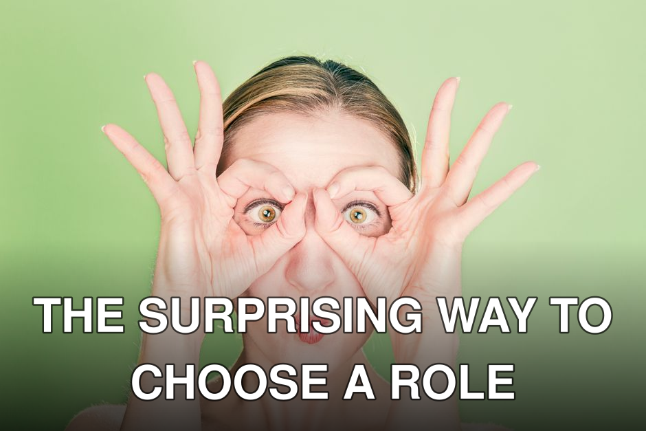 A woman creates a funny face with her hands and eyes against a green background. Perfect for whimsical themes.