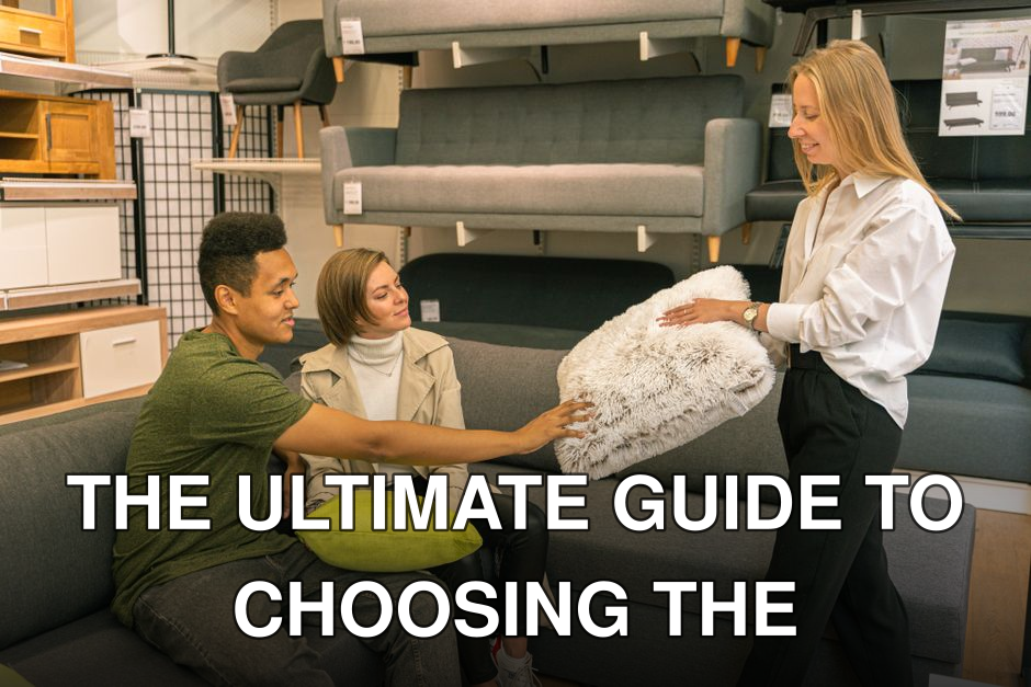 A couple explores pillow options with a saleswoman in a modern furniture store.