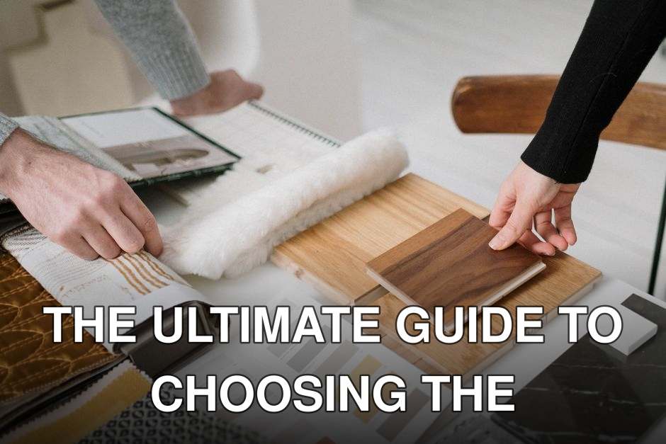 Hands selecting and comparing textile and wood samples for interior design.