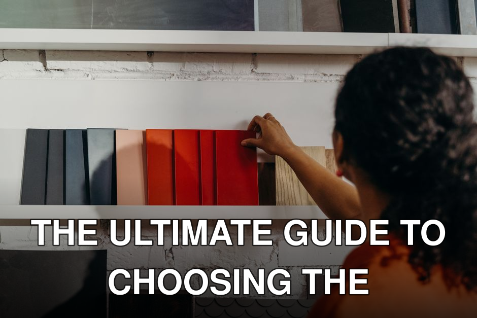 A woman chooses from an array of color samples in a design showroom.