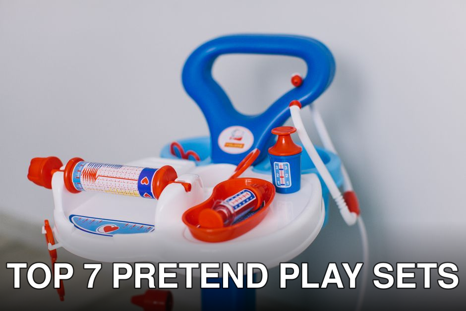 Bright toy medical set with syringes and bottles on white tray for kids' role play.